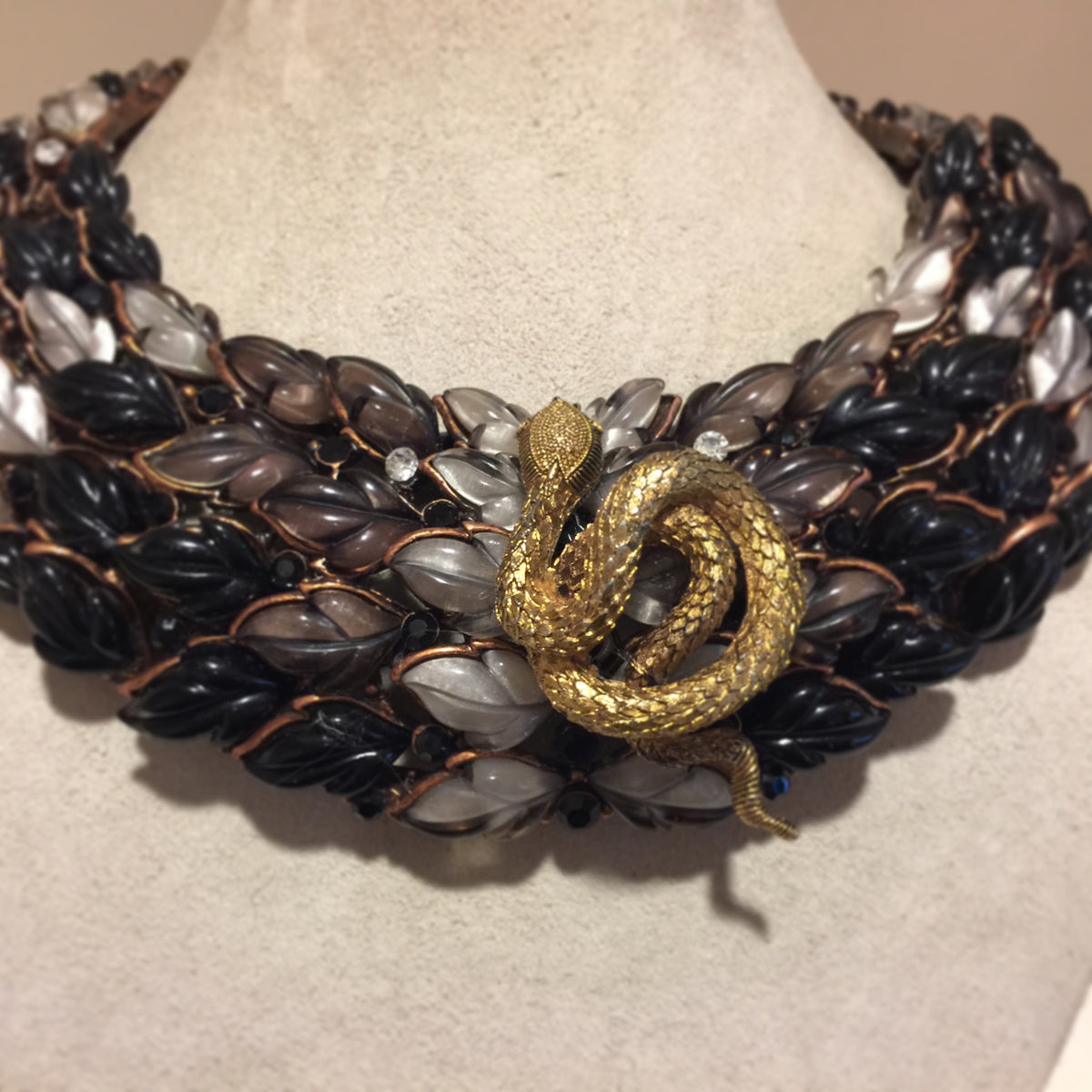 Antique Glass with Coiled Serpent