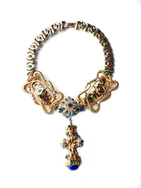 Serpent Buckles and Gem Pendant